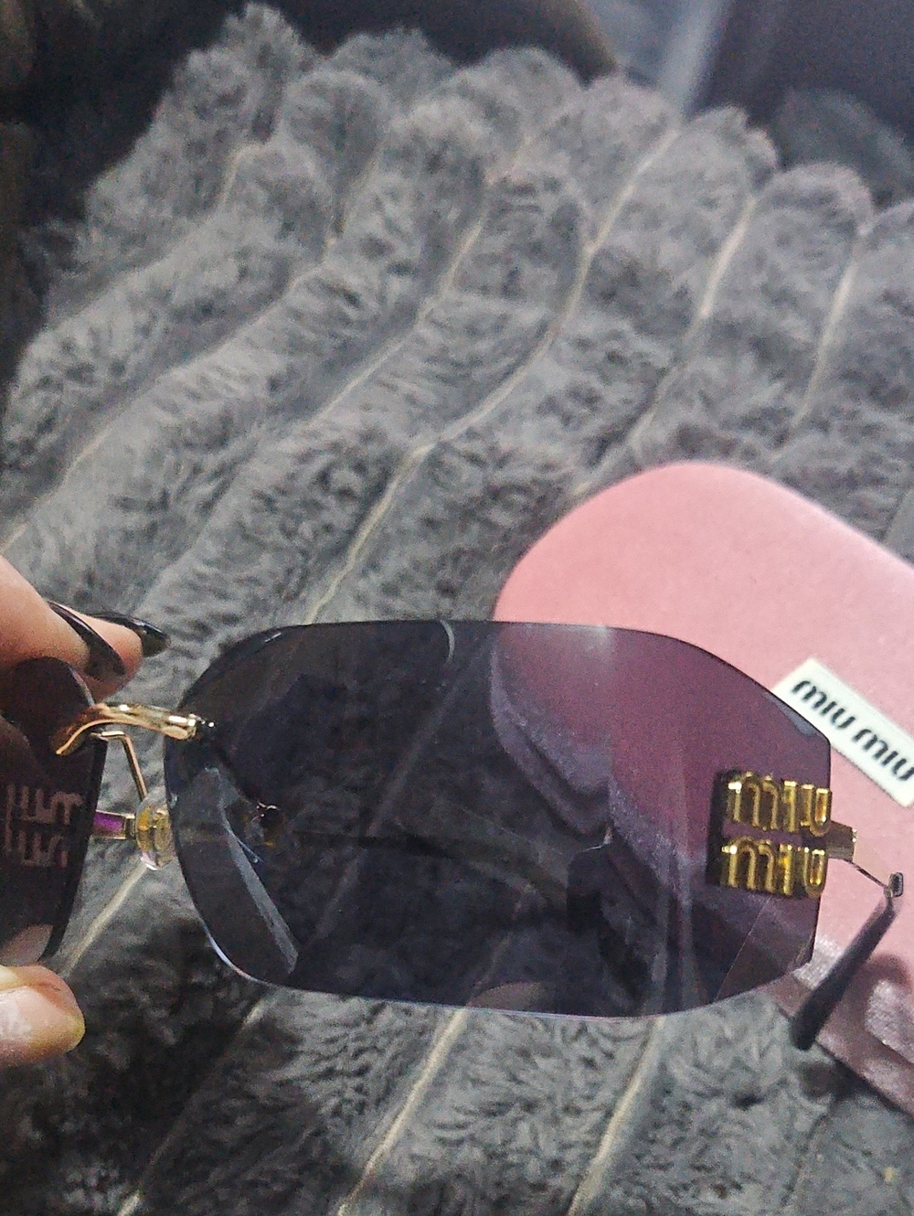 Miu Miu Runway Frameless Sunglasses (Model SMU54Y). - Picture 10 of 15